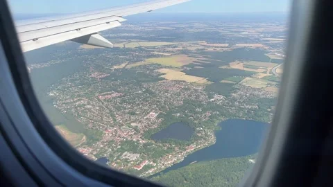View from airplane flying over Berlin in June Stock Footage 199040728