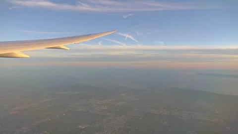 View from an airplane flying over Los Angeles in 4k slow motion 60fps Stock Footage 282984822