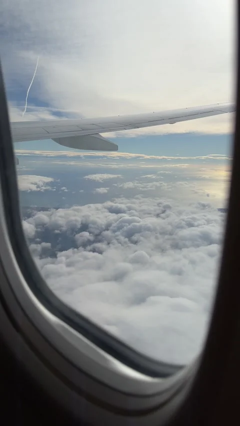 View from airplane flying over Mediterranean sea and Spain. Vertical video Stock Footage 255901689