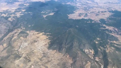 View from airplane flying over mountains of Mexico to Guatemala Stock-Footage 246113366