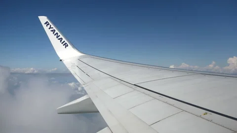 View of an airplane flying through clouds Stock Footage 158944477