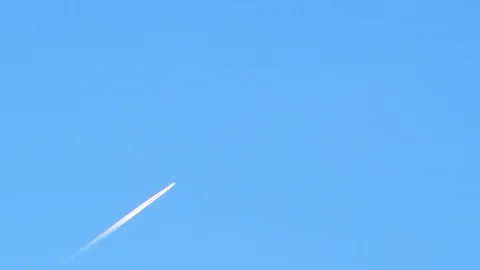 View of airplane jet layer white trace vapour on blue sky Vídeo Stock 105378429