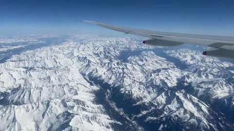 View from an airplane over snowy mountains of China. Stock Footage 218277669