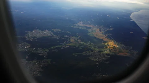 View from an airplane with a porthole Stock Footage 231570536