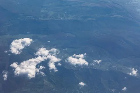 View from airplane reveals patchwork of forests and fields Stock Photos