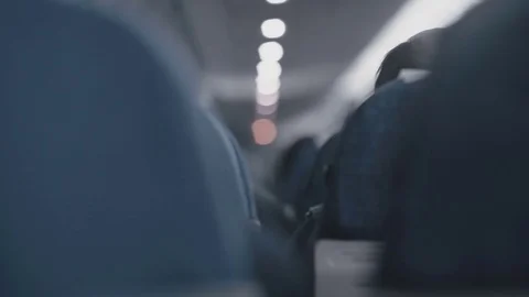 View of airplane seats in a blurred light Stock Footage 73852699