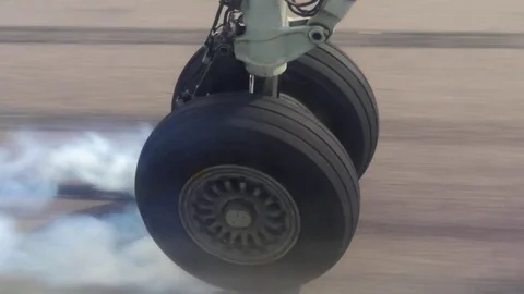 View on airplane wheel at landing, close up shot Stock Footage 82923032