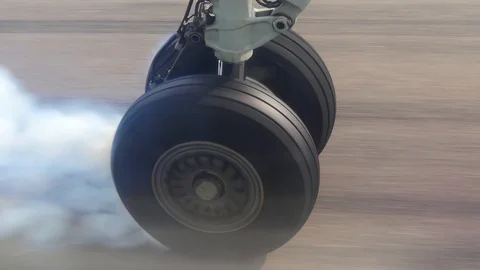View on airplane wheel at landing, close up shot Stock Footage 112347836