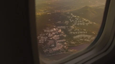 View from airplane window 4 | pov looking out window ibiza territory landscape Stock Footage 118660426