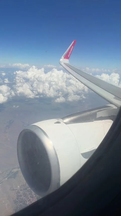 View from Airplane Window of Air Arabia Jet Engine Stock Footage 340407134
