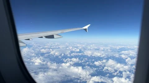 View from airplane window and another plane seen in the distance Stock Footage 227132513