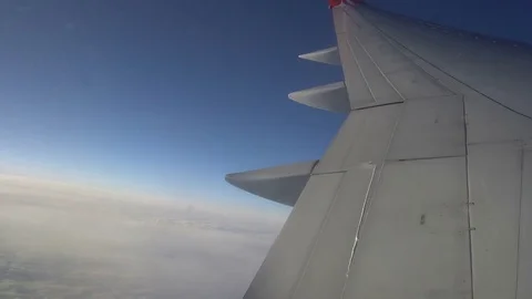 The view from the airplane window. beautiful blue sky Stock Footage 81887632