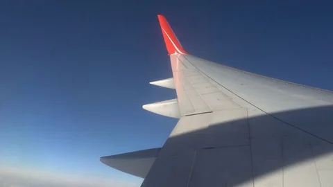 The view from the airplane window. beautiful blue sky Stock Footage 81887812