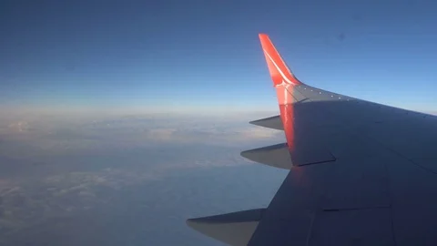 The view from the airplane window. beautiful blue sky Stock Footage 81888190
