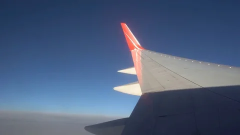 The view from the airplane window. beautiful blue sky Stock Footage 81888564