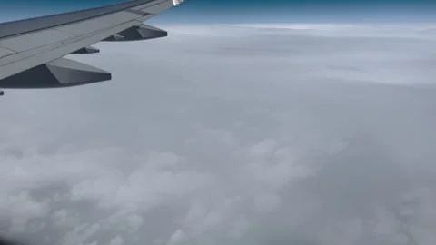 View from airplane window beautiful clouds from up,plane Stock-Footage 242589698