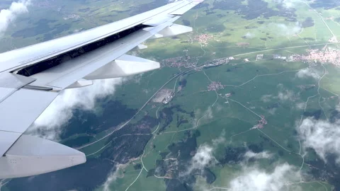 View from airplane window beautiful clouds from up Stock-Footage 242589786
