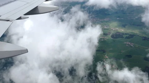 View from airplane window beautiful clouds from up Stock-Footage 242589820
