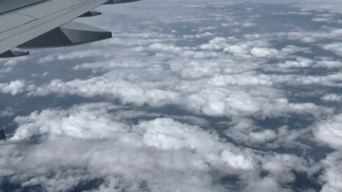 View from airplane window beautiful clouds from up Stock-Footage 242589851