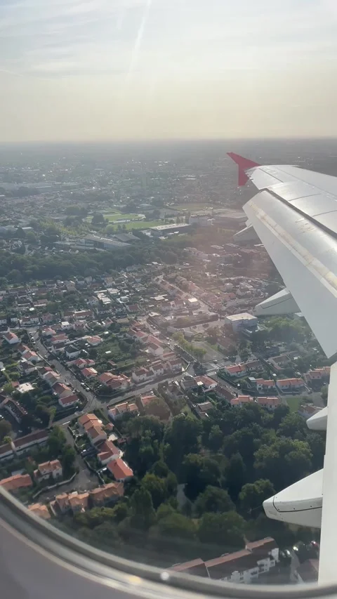 View from the airplane window. Beautiful landscape with blue sky.  Stock Footage 317389962