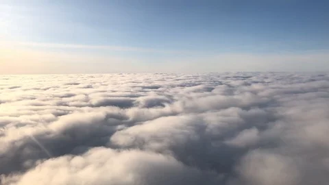 View from the airplane window on the blue sky and white clouds. Travel concept Video stock 127095759