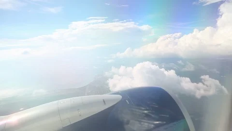 View From Airplane Window Close Up Turbine And Coastline Clouds Below02 Stock-Footage 102499418