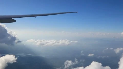 View from the airplane window to the clouds Stock Footage 89329804