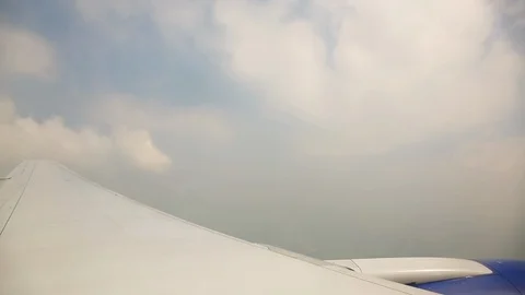The view from the airplane window on the clouds Video stock 116859830
