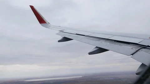 View from the airplane window, the direction of movement of the wings. Stock Footage 167647639