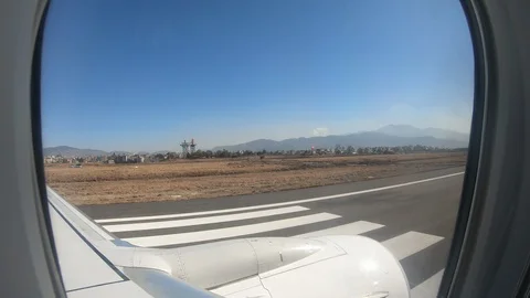 View from airplane window during departure in airport  動画素材 127116873