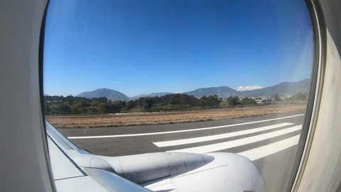 View from airplane window during departure in airport  Video stock 127247944