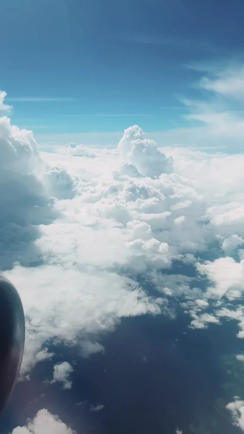 View from airplane window during flight on sunny day Stock Footage 279589909