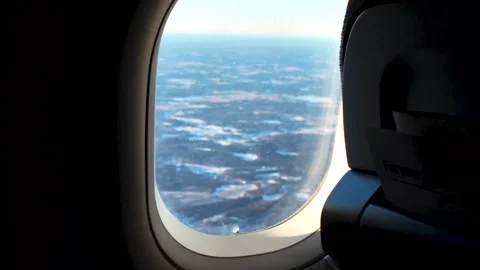 View from Airplane Window During Flight Stock Footage 341703393