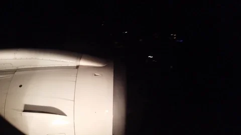 View from airplane window during landing at night Stock-Footage 121189383