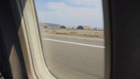 A view from an airplane window during landing in Gran Canaria, filmed in 4K.. Stock Footage 286333332