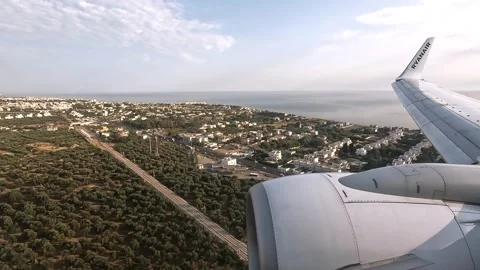 View from an airplane window during landing in Bari, Italy Stock Footage 315934258