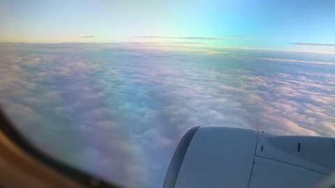 View From Airplane Window Of Engine Turbine Above Clouds Right To Left Stock-Footage 102501164