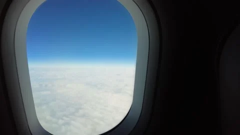 View from airplane window. Flight over a clouds Stock-Footage 169414023