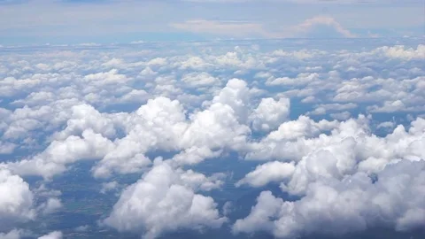 View from the airplane window, fluffy clouds Vídeo Stock 77255954