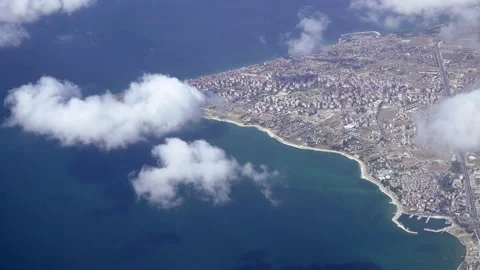 View from airplane window. Fly over land and clouds. Stock-Footage 157209354