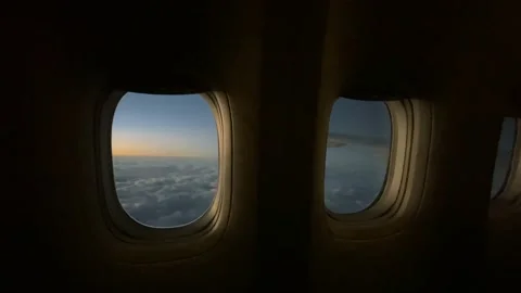 View from the airplane window flying over the clouds Stock Footage 168176958
