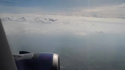View from airplane window flying over city Stock Footage 219775318