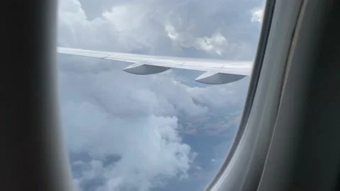 View from airplane window. Flying through thunderstorm clouds Stock Footage 161095386