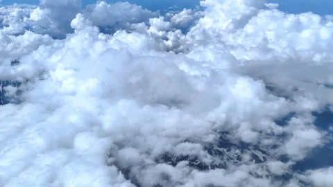 View from airplane window to the mountains with snowy picks. Stock-Footage 283014911