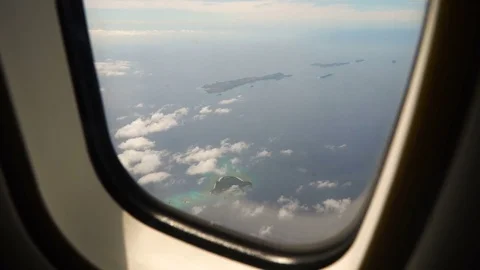 View from an airplane window on the ocean. Stock Footage