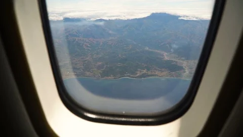 View from an airplane window on the ocean. Stock Footage