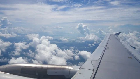 A view from the airplane window over the wings and engines. The planes are fl Stock Footage 80105782