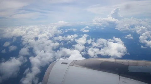 A view from the airplane window over the wings and engines. The planes are fl Stock Footage 80105900
