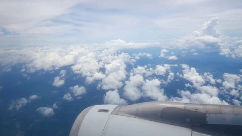 A view from the airplane window over the wings and engines. The planes are fl Stock Footage 80105935