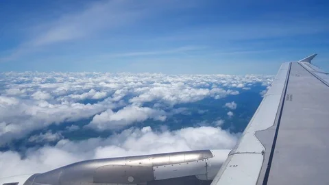 A view from the airplane window over the wings and engines. The planes are fl Stock Footage 80106083